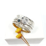 Heart gazing hare and gemstone spinner ring