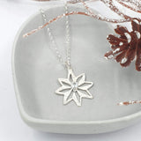 Hammered star with Sky Blue Topaz - medium