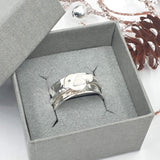 Robin spinner ring with heart wing