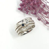 Heart gazing hare and gemstone spinner ring