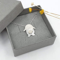 lop bunny necklace with daisy