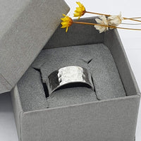 Hammer textured wide band ring