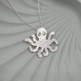 octopus necklace with mid blue eyes