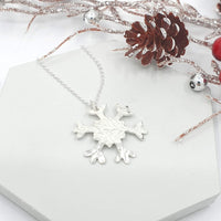 Large hammered snowflake necklace