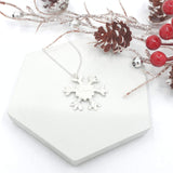 Large hammered snowflake necklace