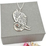 ornate elephant necklace with gemstone