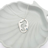 Open seahorse necklace with Blue gemstone