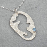 open seahorse necklace with Blue gemstone