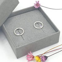 purple orbit circle earrings