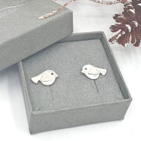 Robin stud earrings with silver wings
