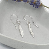 silver feather drop earrings