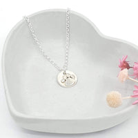 paw print disc necklace