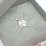 paw print disc necklace