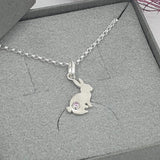 bunny with pink stone necklace