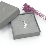 bunny with pink stone necklace