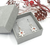 Snowflake drop earrings with garnets 